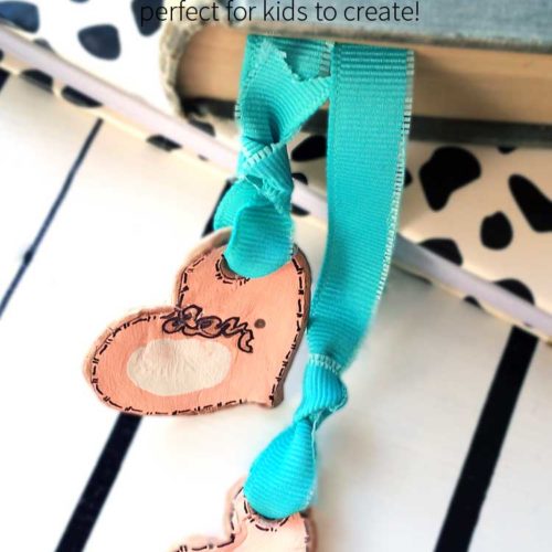 easy clay heart bookmarks. These are made with air-dry clay found at your local store. They are easy to make and great to personalize for Valentine's day with your child's thumbprint! Great idea for gifts.