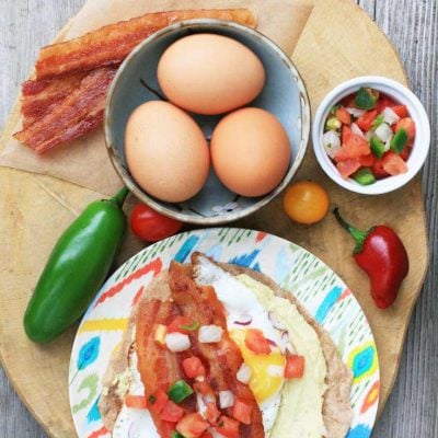 Egg, hummus, and bacon breakfast tacos. Lots of flavor here!