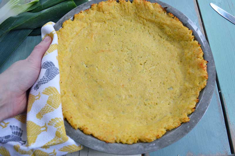 Cauliflower crust for a cheddar, mushroom, and leek quiche.