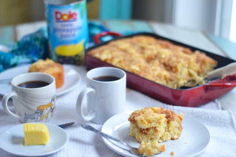 Pineapple coffee cake with coconut crumble. The perfect pairing in this rich and buttery cake perfect for Easter Sunday!