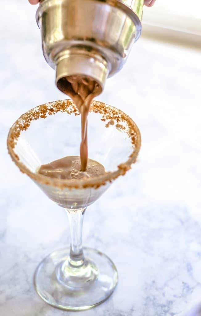 A liquid version of your favorite campfire treat. This liquid s'more cocktail features marshmallow vodka, Irish Cream, and cream...easy and delicious!
