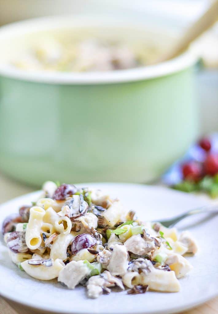 This Chicken Wild Rice Pasta Salad recipe adds in elbow macaroni and additional wet ingredients to compensate for the added dryness. It still stays true to the traditional chicken and wild rice salads...with an improvement of delicious pasta. It is creamy, bright, earthy, and satisfying. You'll want to bring this to your next potluck!
