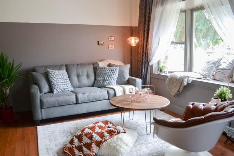 living room makeover - after photo with new couch, window seating
