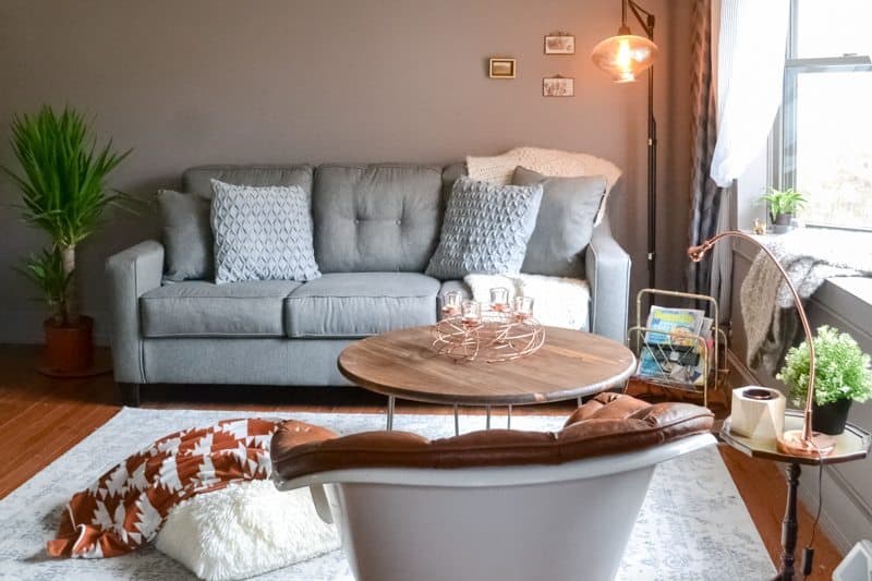 living room makeover - after photo with new couch and new lamp