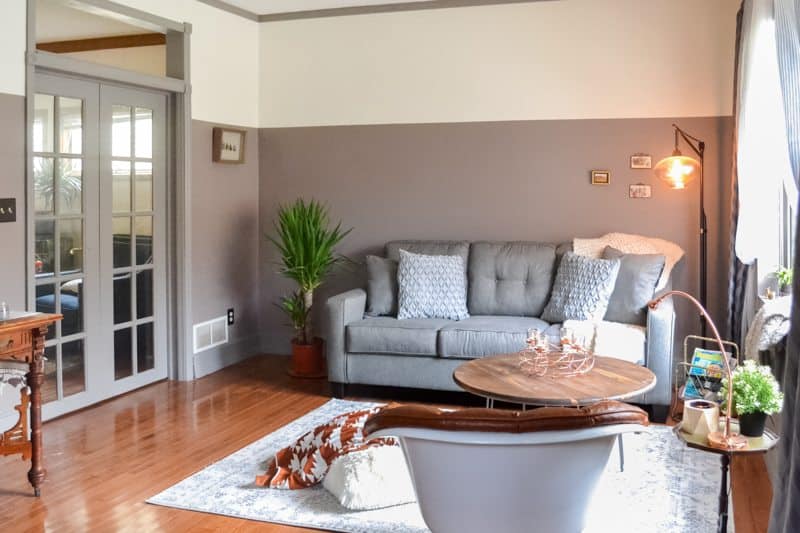 living room makeover - after photo with new couch, transom