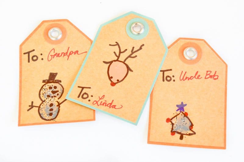 Thumbprint Christmas gift tags are a perfect way to include small children in the gift wrapping process. These are simple, easy and fun!
