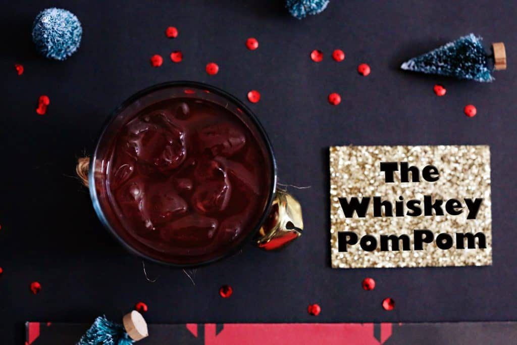 The Whiskey Pom Cocktail. A delicious mix of pomegranate juice and whiskey. An easy, delicious, and beautiful whiskey cocktail recipe!