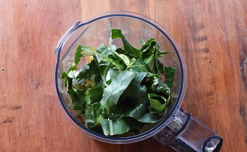 Collard greens and olives pesto recipe for a delicious and easy twist on the traditional basil pesto recipe!