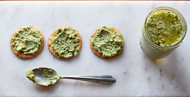 Collard greens and olives pesto recipe for a delicious and easy twist on the traditional basil pesto recipe!