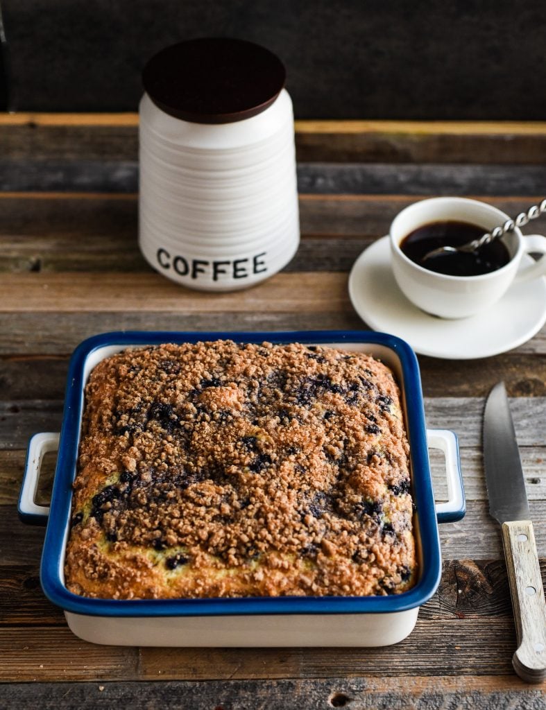 a pan of blueberry buttermilk coffee cake with cinnamon streusel