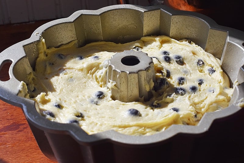 sour cream blueberry bundt cake in a pan