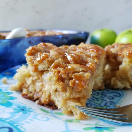 apple coffee cake on the plate with a fork