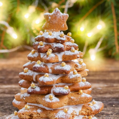 gingerbread tree is easy to make with stacked gingerbread cookies and frosting