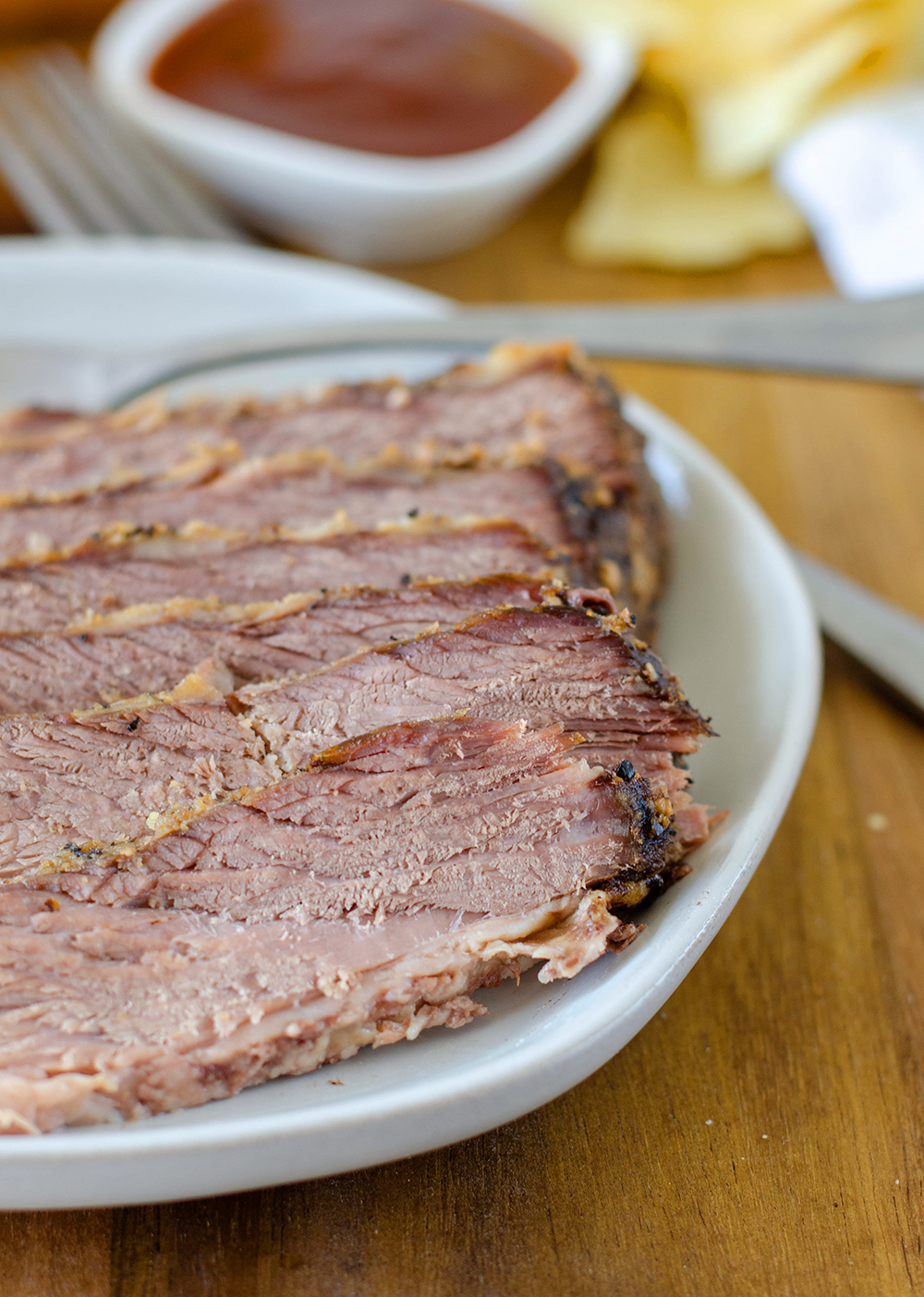 Sliced CrockPot beef brisket on a plate