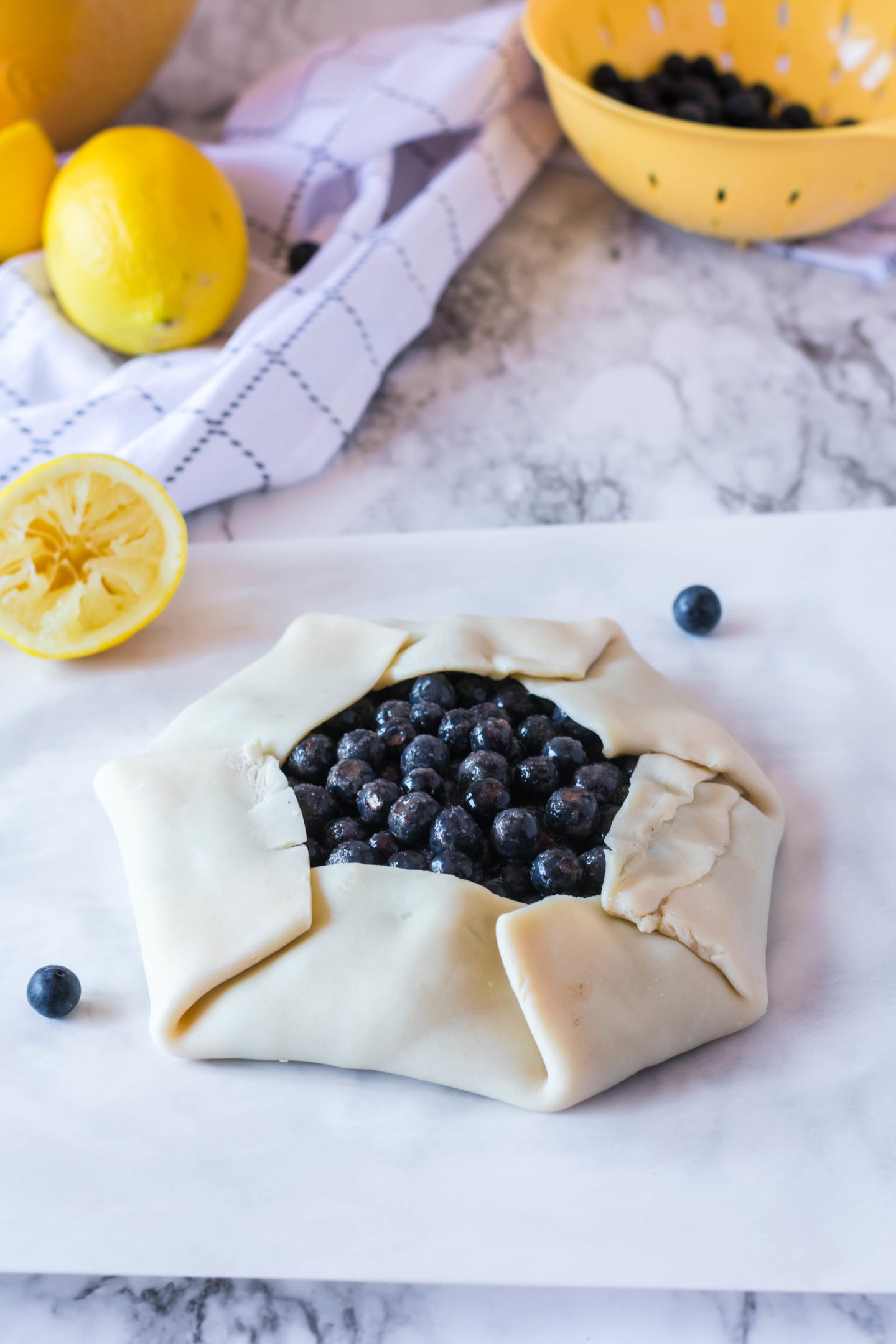 fresh blueberry filling in a pie crust tart