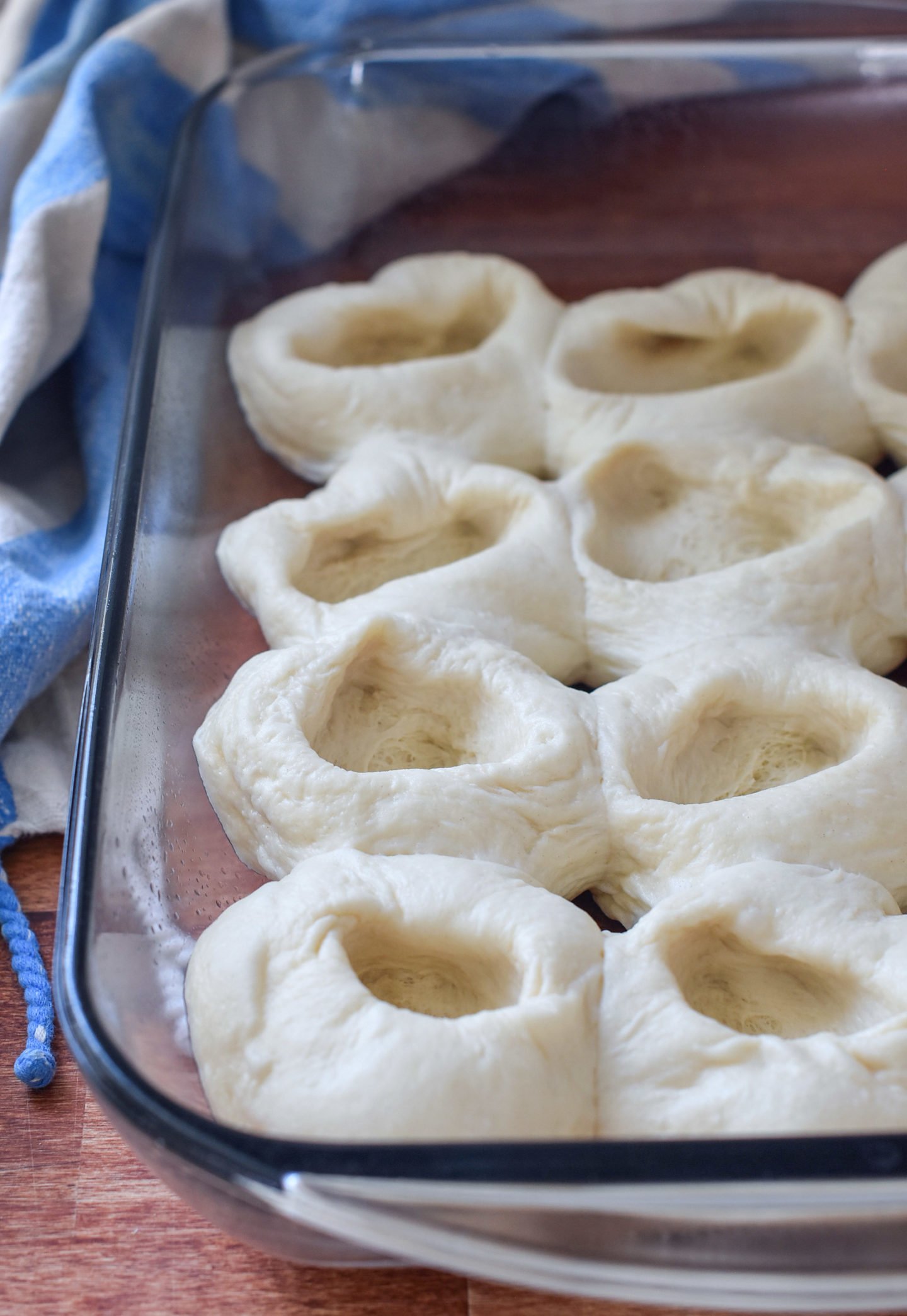 Dinner roll dough with pockets in their center