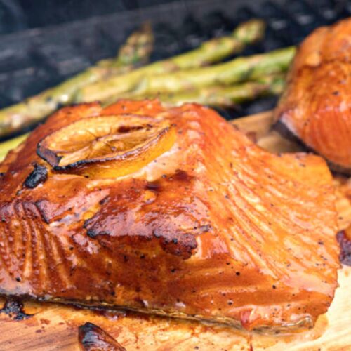 salmon on a cedar plank being grilled