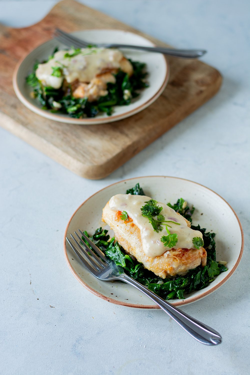 Chicken florentine with sauteed spinach.