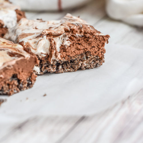 No bake chocolate cheesecake filling on top of chocolate cereal bar crust.