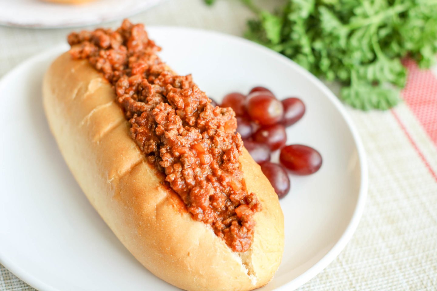 sloppy joe sauce in a bun ready to nosh on!