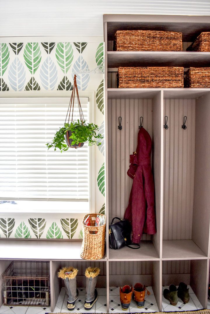A gorgeous updated entry with DIY cubbies, stenciled wall, and many more beautiful details.