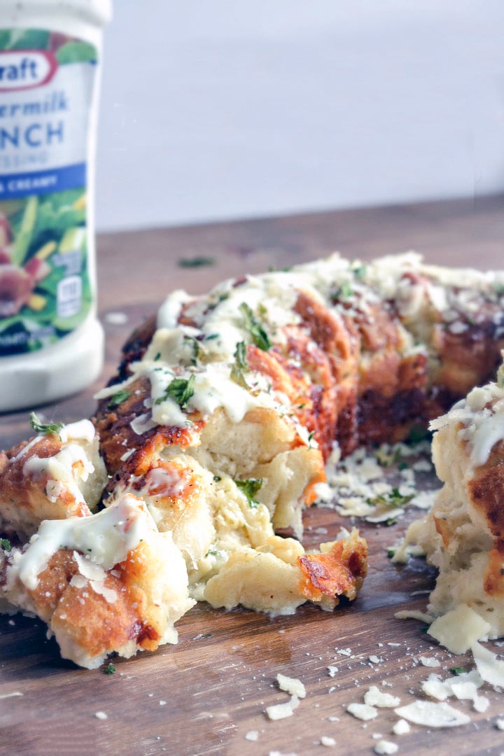 Cheesy pull apart bread made with biscuits and a bottle of ranch dressing.