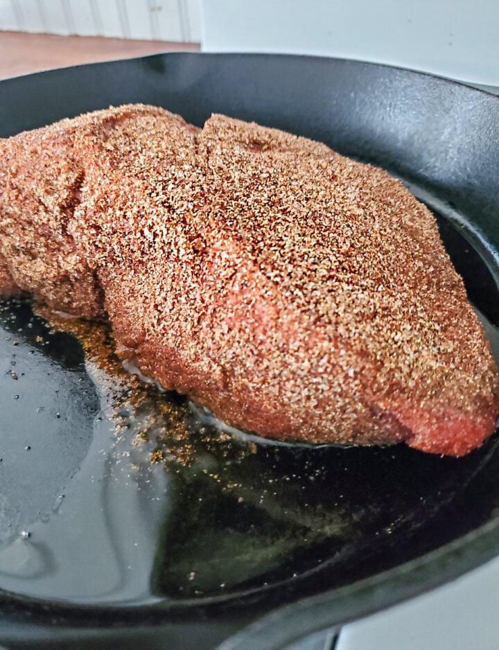 Sear the Guinness beef roast on both sides before putting it into the oven.